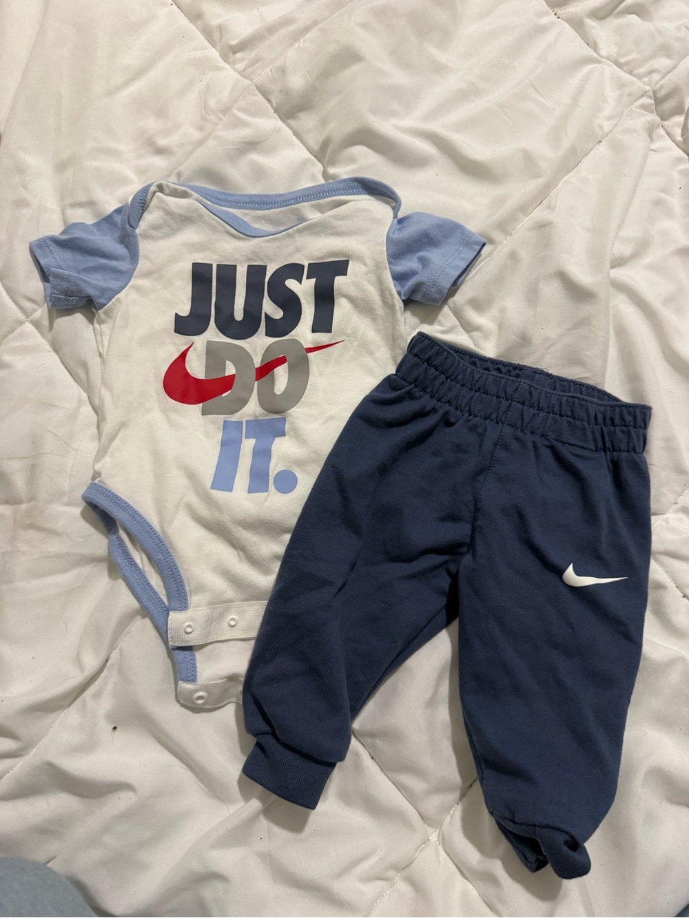 Nike White & Light Blue 'Just Do It' Bodysuit with Navy Pants
